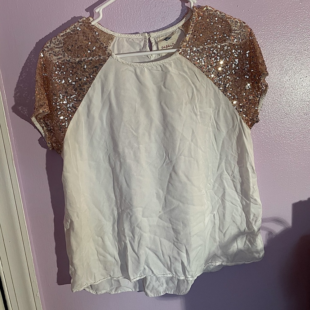 Gold sleeve white top